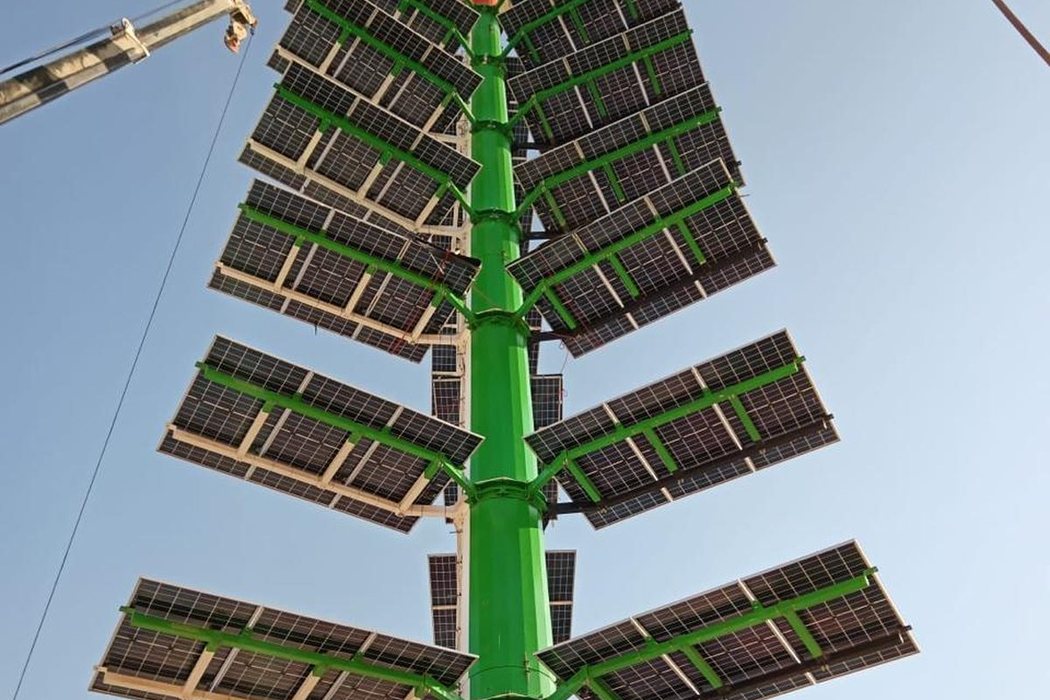 Solar panels mounted vertically on a telecom tower
